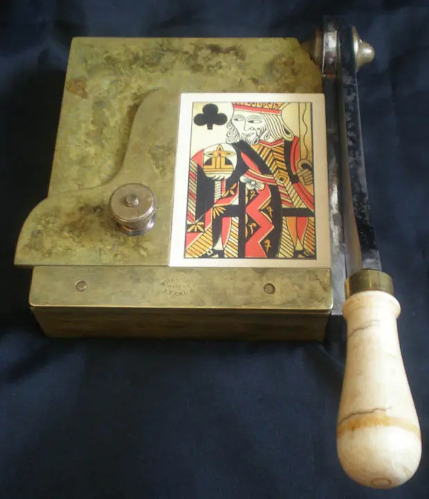 Card cutters were used to cut the frayed edges off cards.