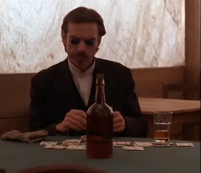 Dennis Quaid as Doc Holliday sporting his gambling shades.